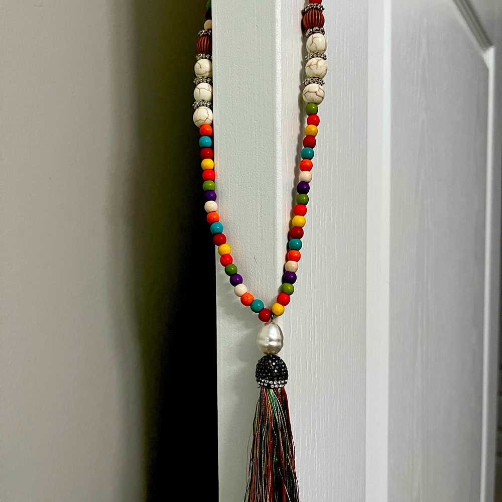 21 total length multi color bead necklace with tassel